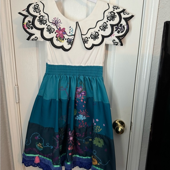 Encanto mirabel costume. Purchased at Disney store. Good condition. - Picture 2 of 5